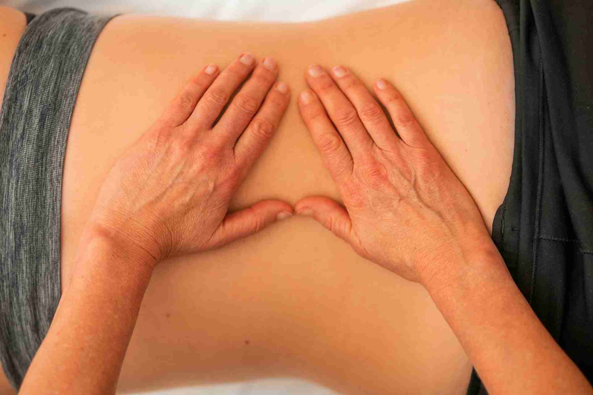 A Physiotherapist's Guide to Lower Back Pain Treatment 1 physiotherapy technique being applied to lower back for pain relief